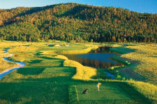 Golf Hole 18 male golfer t off